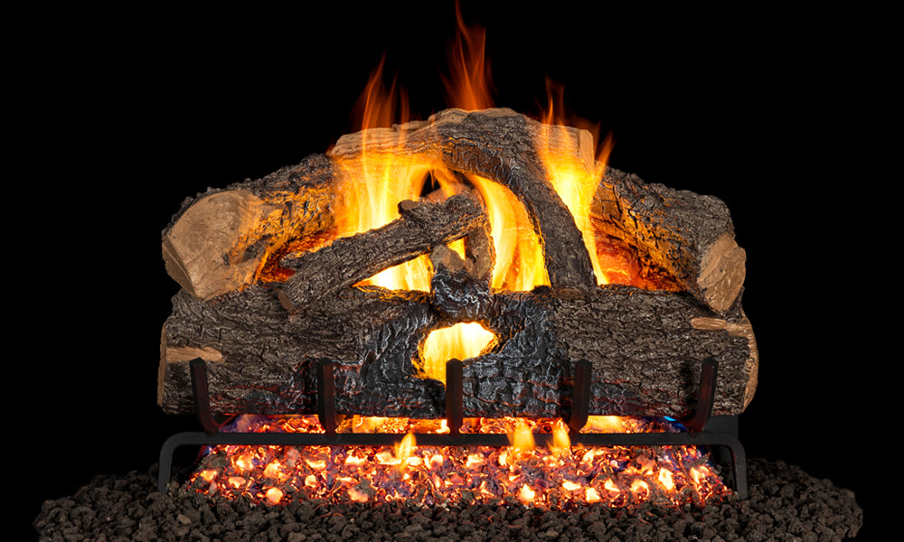 Charred Evergreen Oak gas log set with burning flames and glowing embers from the Traditional Logs collection.